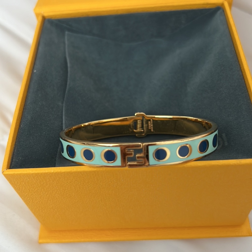 Fendi bracelet and ring set.
